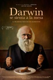 darwin se sienta a la mesa